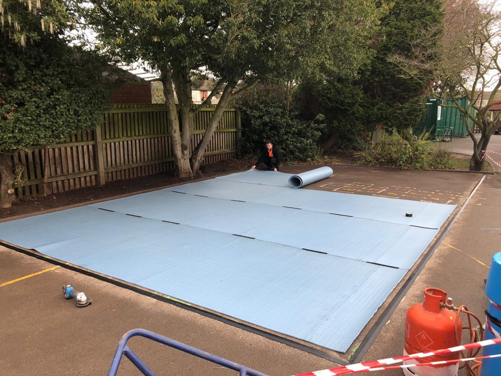 image of shocked being laid to school playground