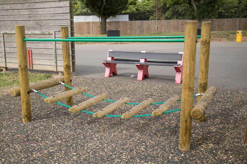 image of a wobble bridge with eco mulch surface in a primary school
