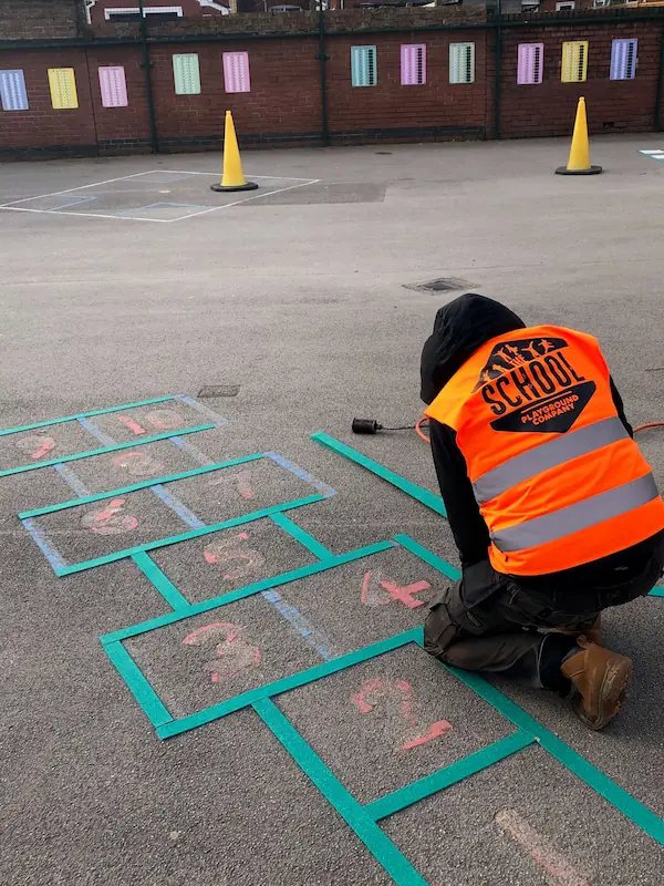 School Playground Company repairs and upkeep on hopscotch playground markings- playground installation