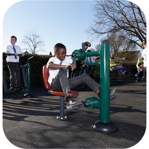 Child using rowing machine outdoor gym equipment for kids