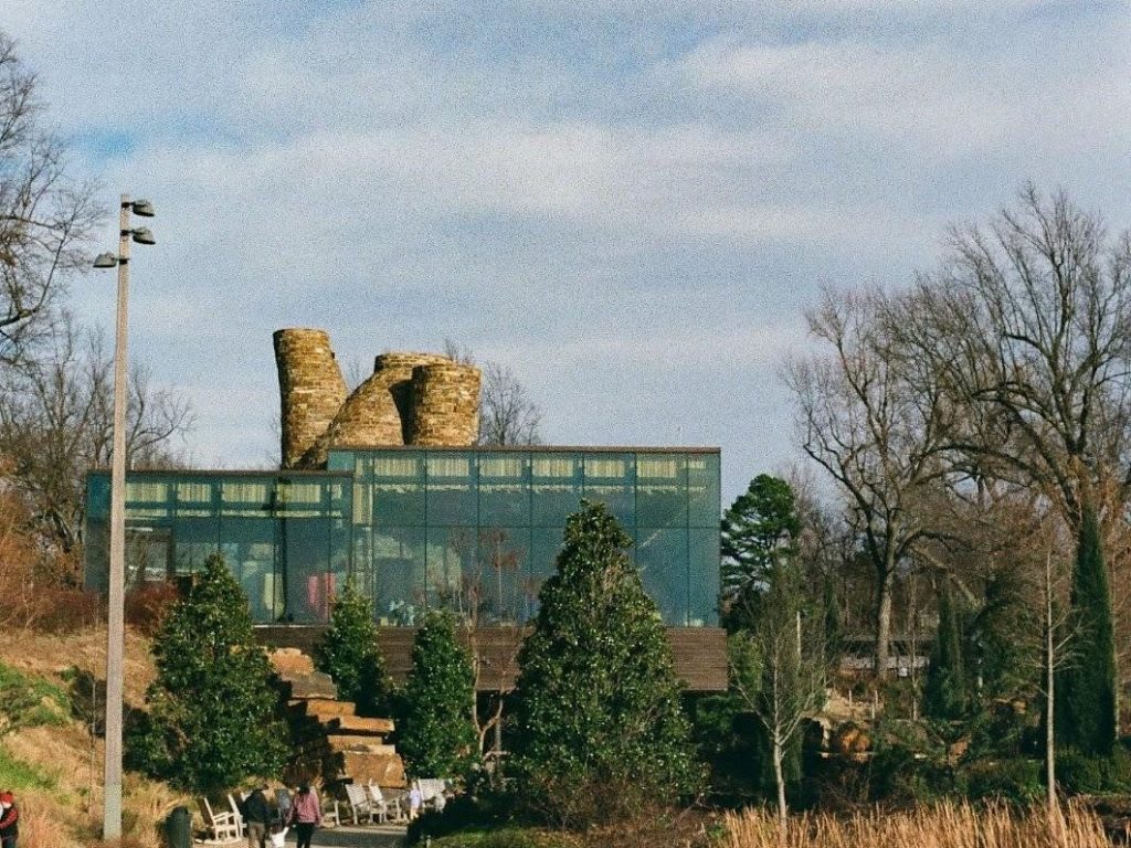 Gathering Place Tulsa with a combination of modern and classic architecture and natural pond area