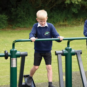 child using double health walker outdoor gym equipment for kids