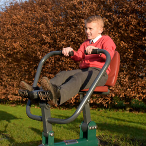 A child using a rower from our outdoor gym equipment range