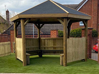 open sided hexagonal wooden gazebo
