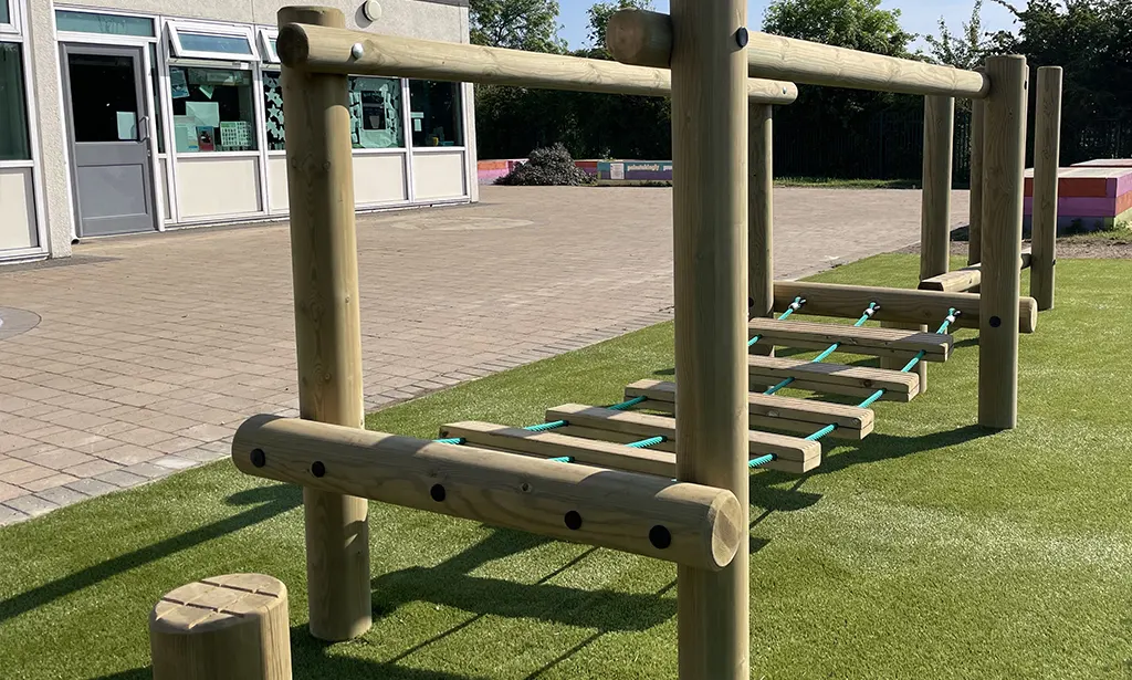 Wooden trim trail wobbly rope bridge