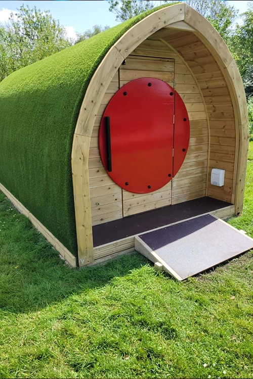 Outdoor Classroom Hobbit House rounded roof and circular door