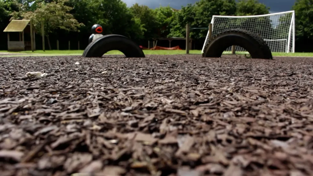 Brown rubber mulch installed under tyre trail