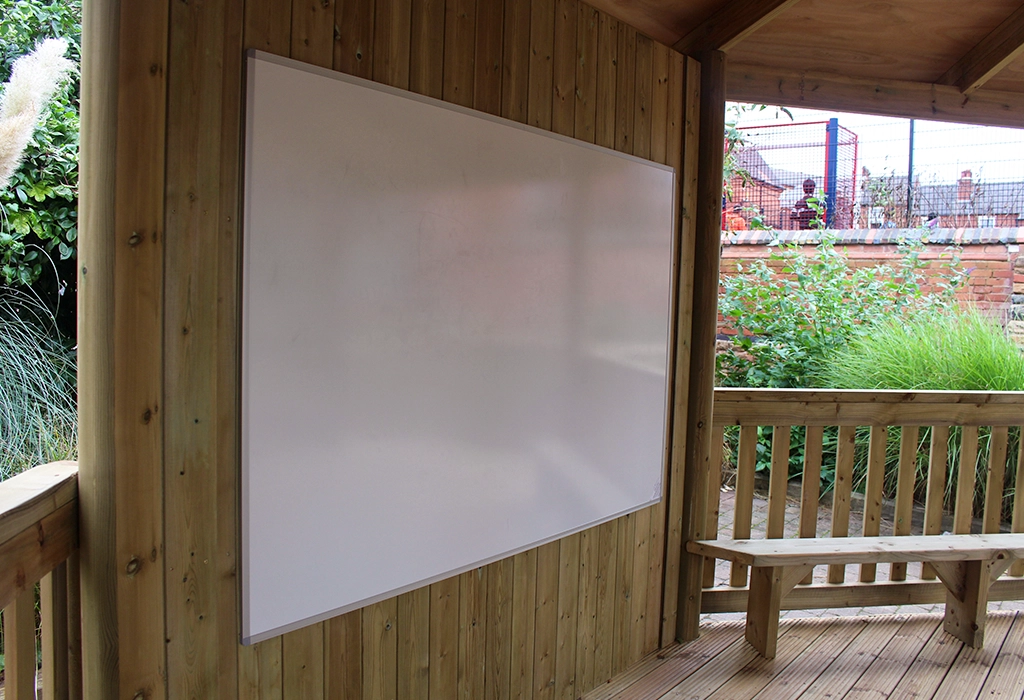 large whiteboard panel installed inside a gazebo