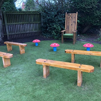 Storytelling Area with benches, mushroom stools and storytelling chair