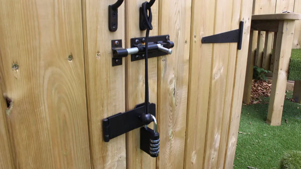 A lock on an outdoor classroom storage box.