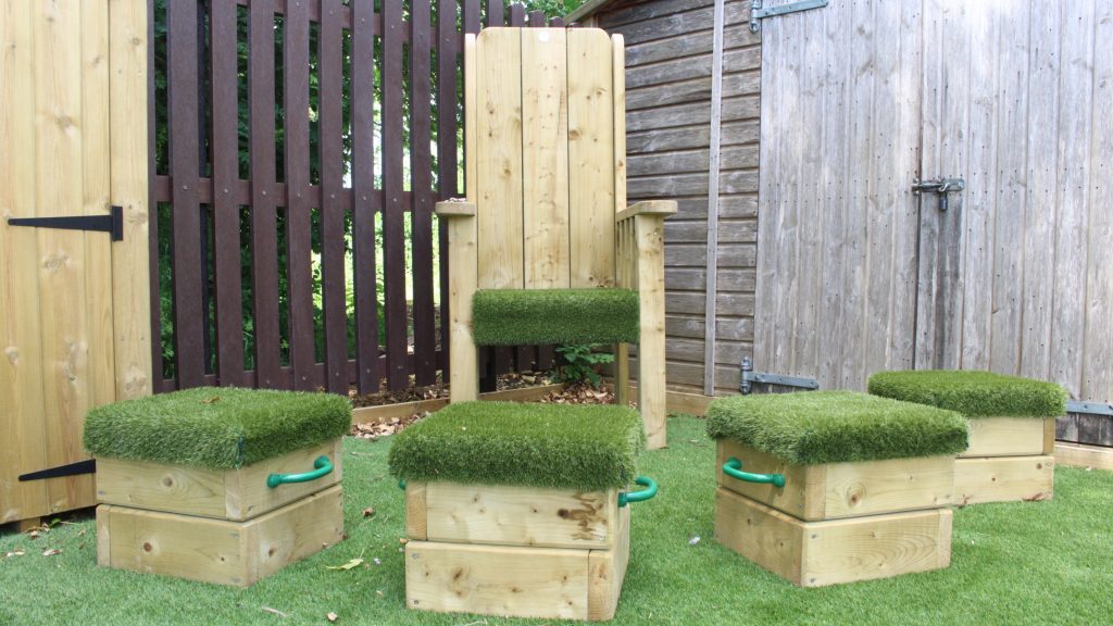 Outdoor Reading Area with storytelling chair and 4 seating cubes