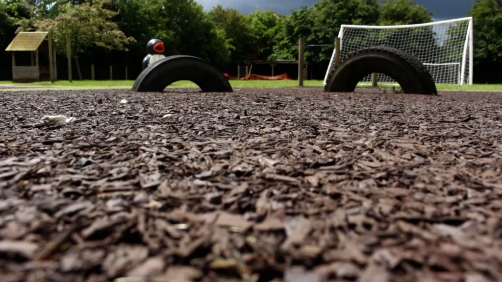 Brown rubber mulch installed under tyre trail