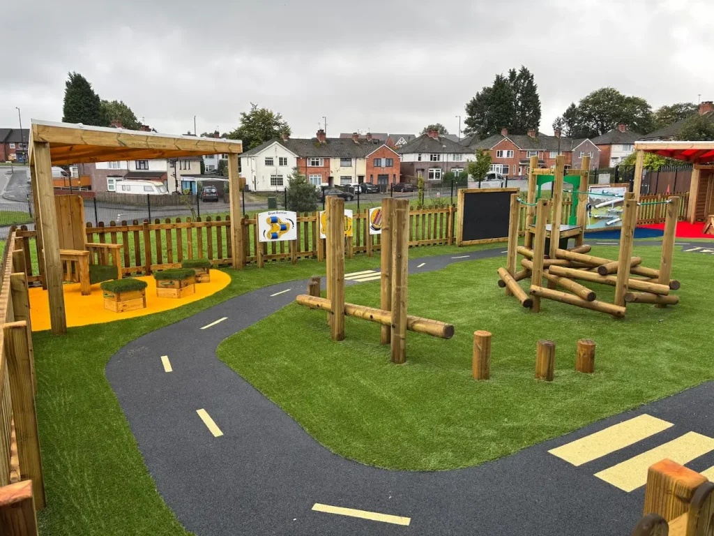 EYFS Playground with race track markings and active play equipment