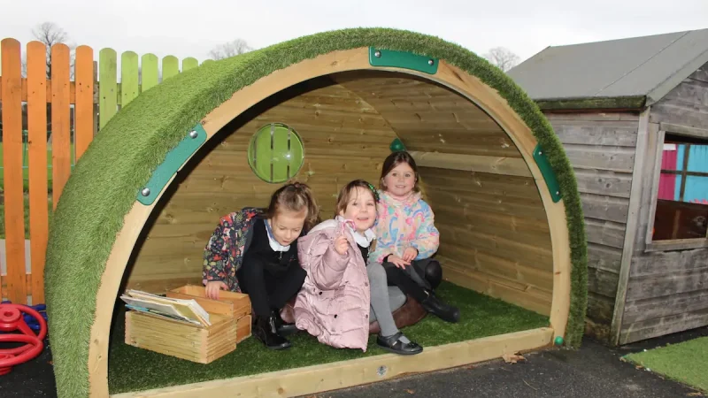 Children reading in hobbit house den reading nook
