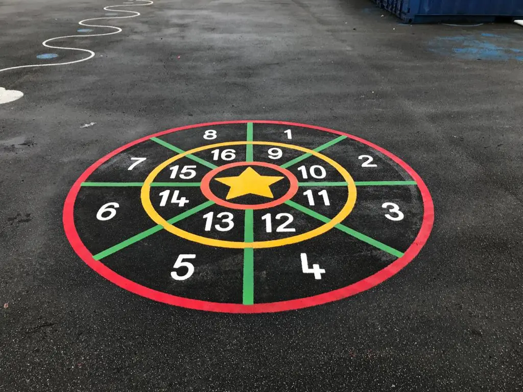 Target game playground markings with star bullseye