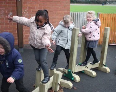 Children enjoying a Free-Standing Trim Trail