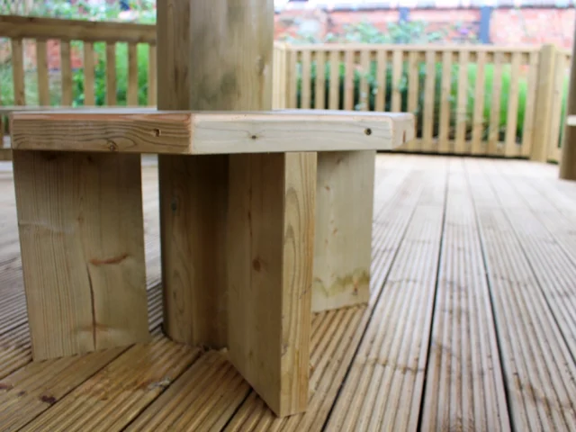 wooden small seat in a large timber gazebo in a Nottinghamshire school playground