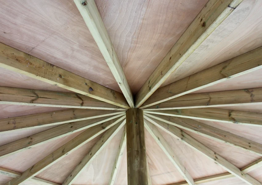 Wooden roof beams in a school outdoor classroom gazebo in a Nottinghamshire school playground