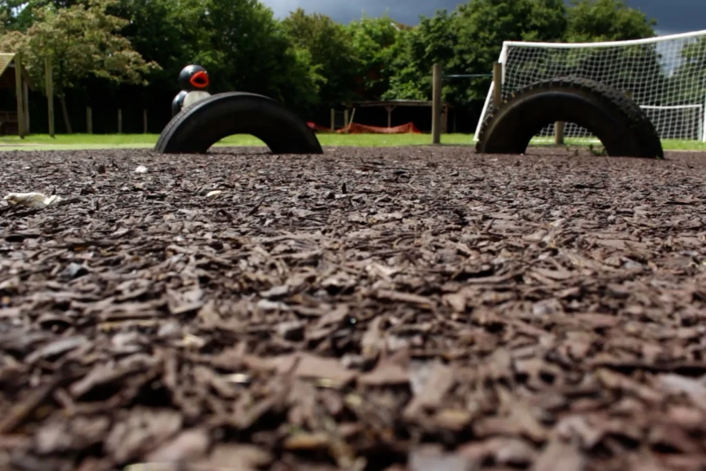 Brown rubber mulch installed under tyre trail