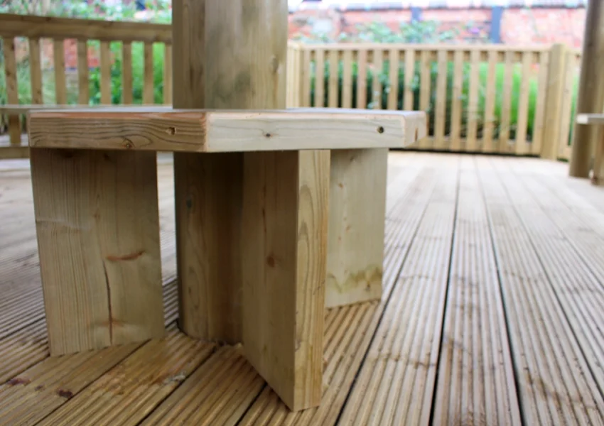 wooden small seat in a large timber gazebo in a Nottinghamshire school playground